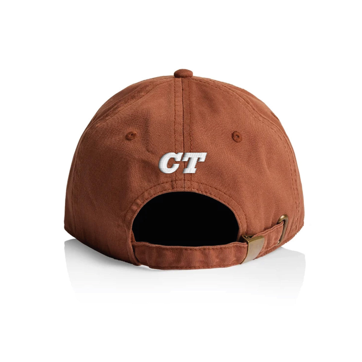A terracotta cotton baseball cap shown from the back, featuring a white embroidered 'CT' logo on the back panel and an adjustable strap with a brass buckle.