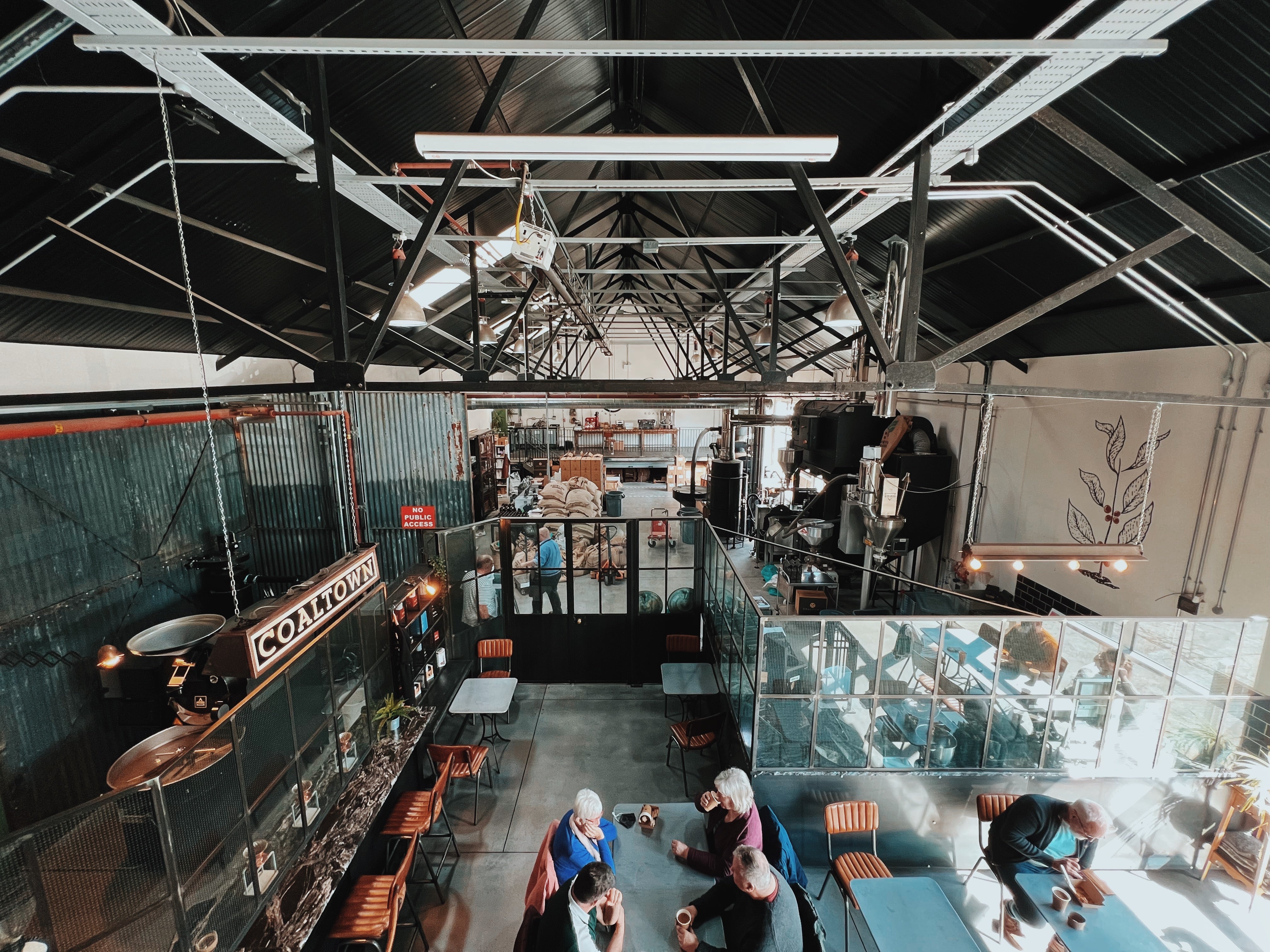 A view of Coaltown Coffee's Roastery and Espresso Bar, shot from the mezzanine 
