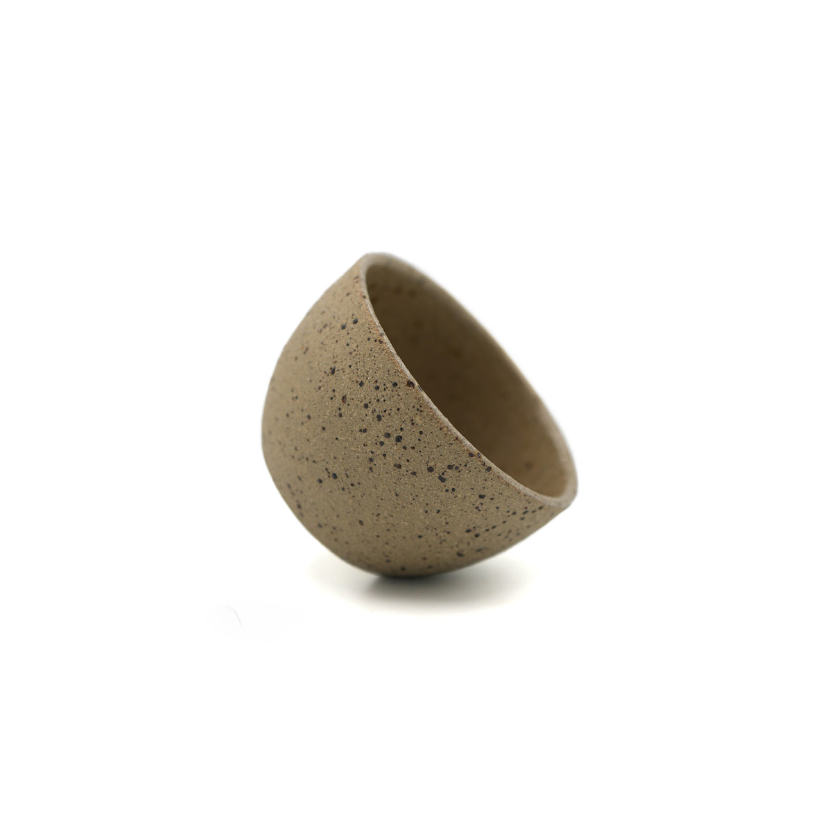 A small, dome-shaped ceramic cup with a speckled taupe-brown glaze, shown on a clean white background.