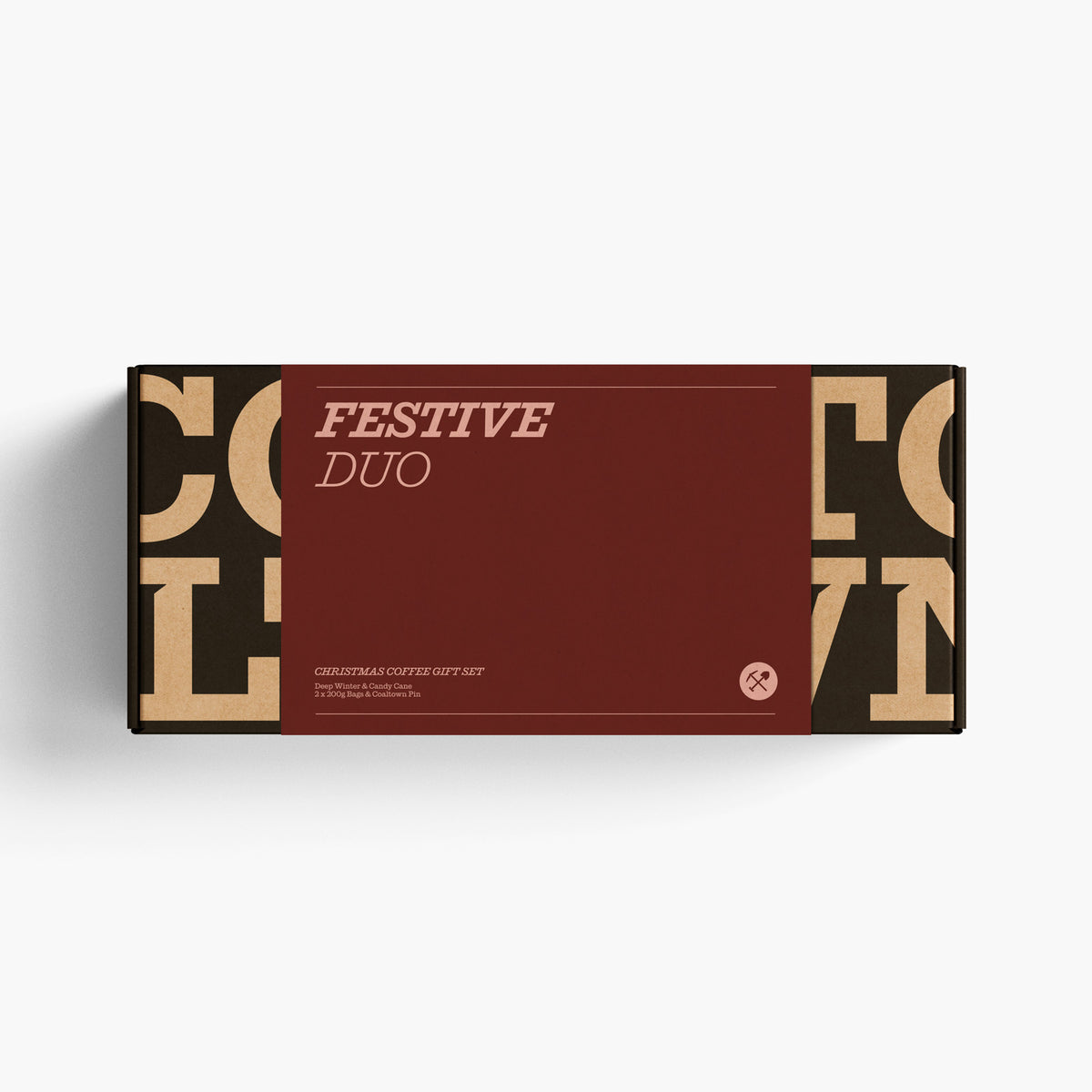 A rectangular coffee gift box labeled 'FESTIVE DUO' on a clean white background. The box features a large dark red center panel with cream text, and patterned dark brown and beige sides with large decorative letters.