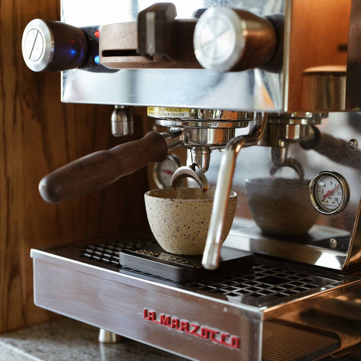 Flat White Ceramic Coffee Cup Handmade Matt Jones Ceramics Collaboration On A La Marzocco Mini Machine With Espresso Pouring in