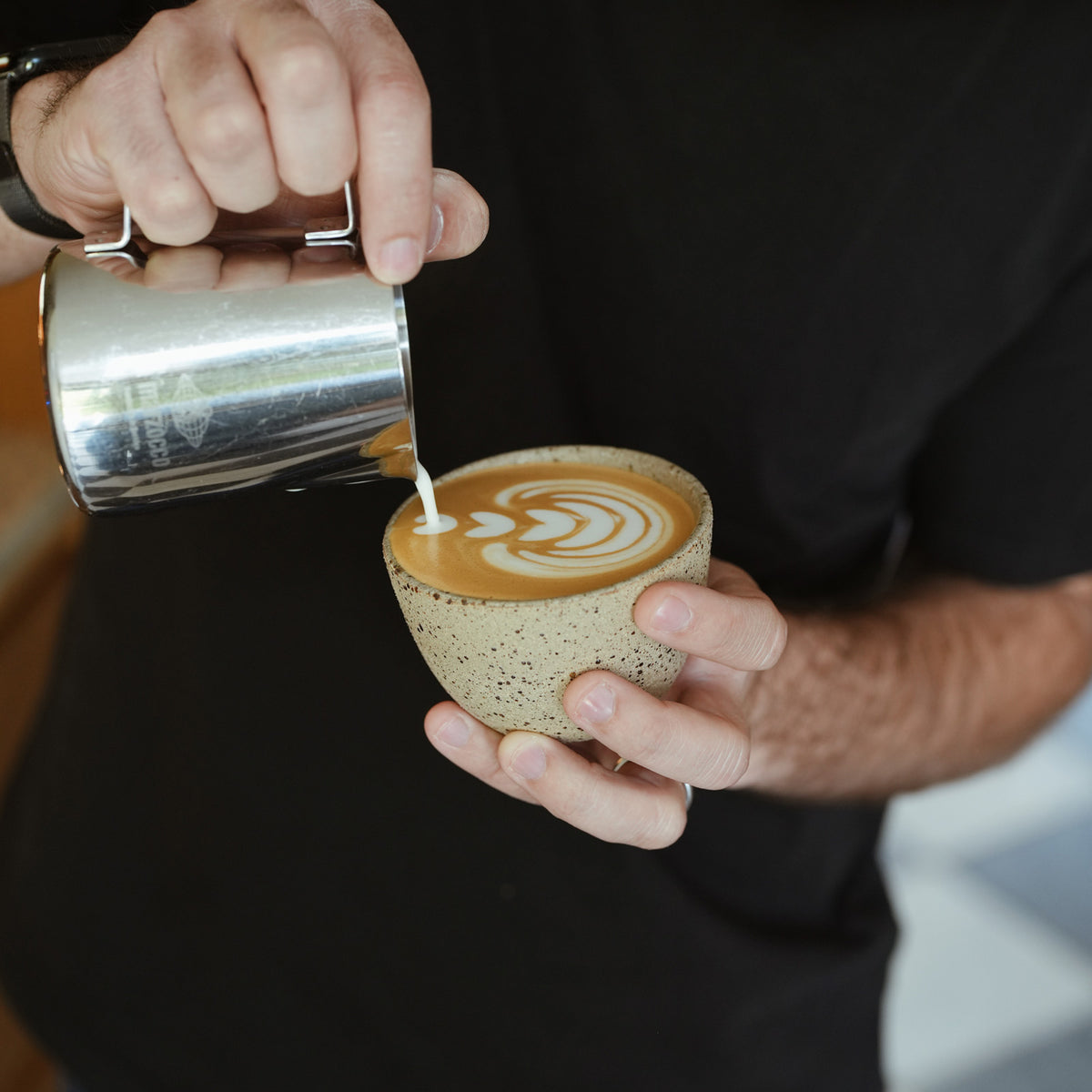 Flat White Ceramic Coffee Cup Handmade Matt Jones Ceramics Collaboration tulip latte art being poured into the mug